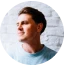 small circular avatar image of author Greg Hooper